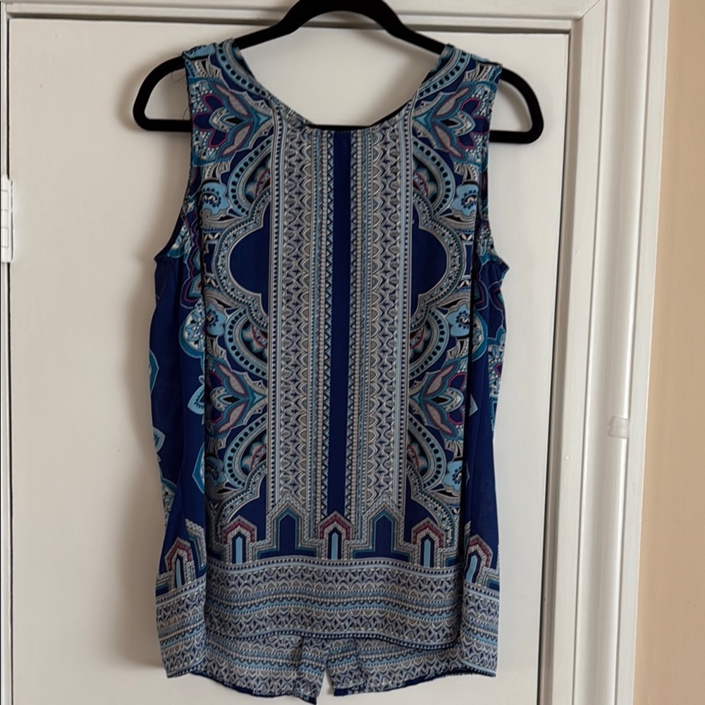 Women’s Blue Patterned Sleeveless Top. Size Medium. Buttons down the back